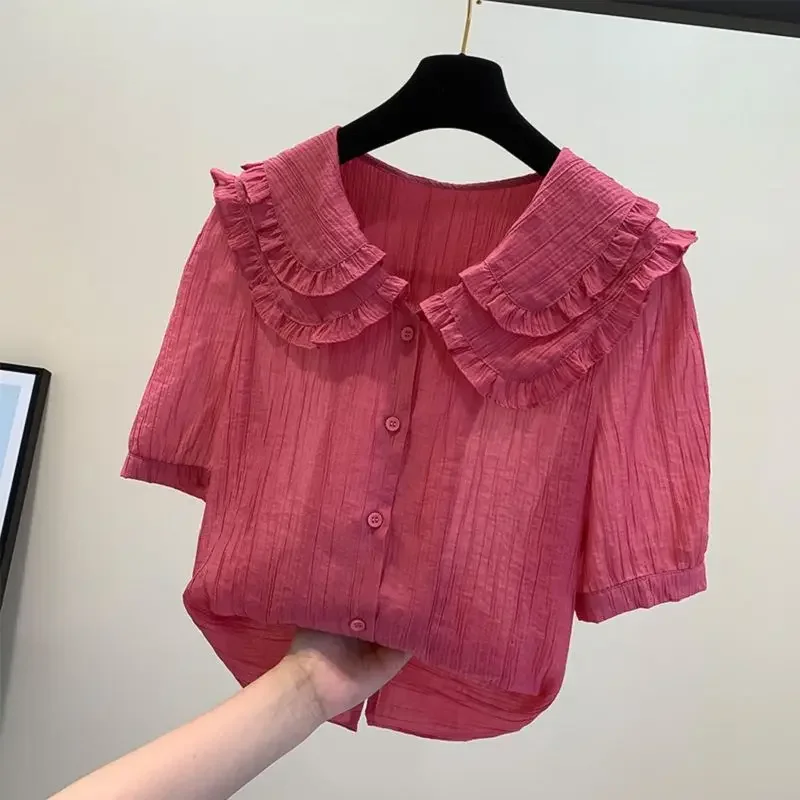 

Elegant Peter Pan Collar Spliced Ruffles Sweet Shirt Women's Clothing 2024 Summer New Casual Tops Loose Office Lady Blouse X618