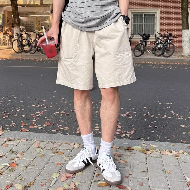 

Рабочая одежда цвета хаки, мужские летние тонкие повседневные свободные брюки из чистого хлопка с пятью точками, молодежные активные брюки для путешествий, удобные дышащие...