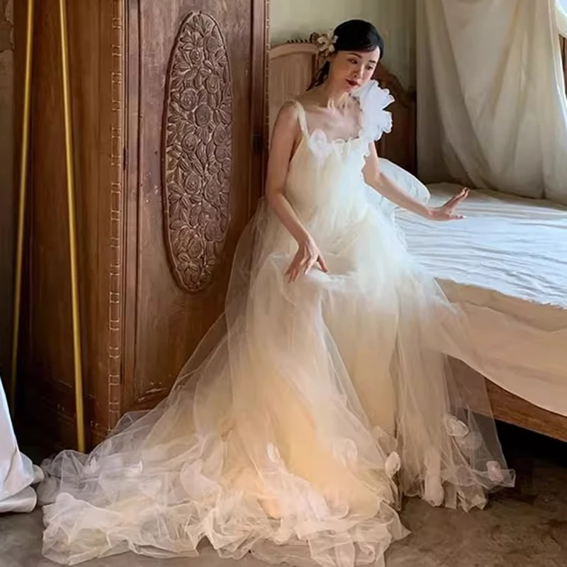 Bohemian Sheer Tulle Wedding Dress with Floral Accents Vintage Asymmetric Neckline Bridal Dress Train Beach Weddings