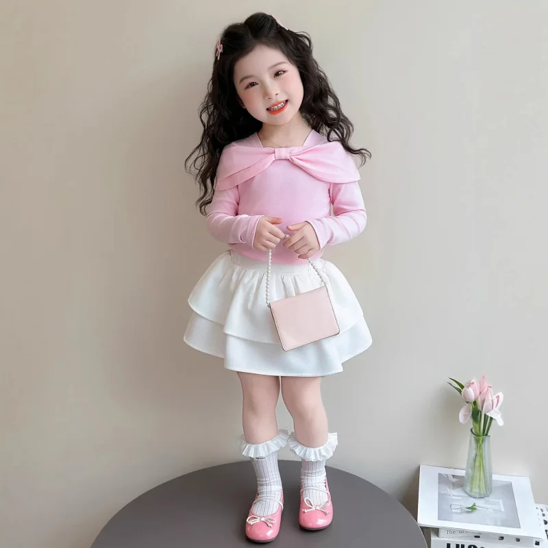 In-stock, quick delivery: Fashionable and versatile spring outfit for girls, stylish two-piece set with bow and pleated skirt fo