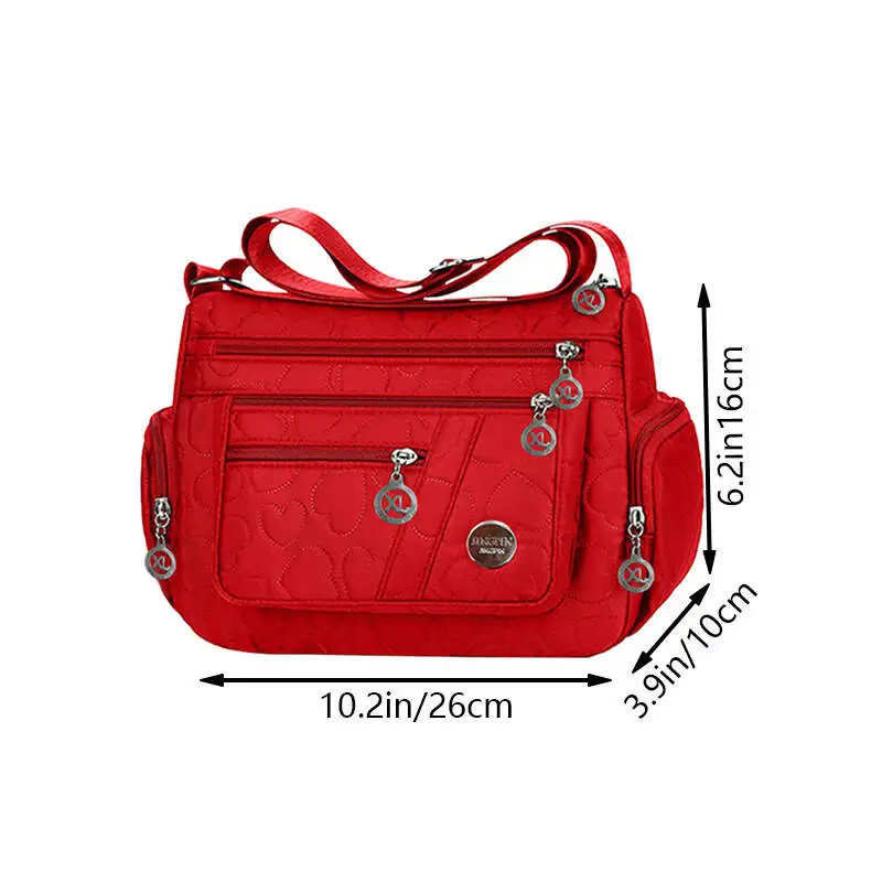 Schicke, verzierte Damen-Umhängetasche für den täglichen Pendelverkehr. Stilvolle, leichte, lässige Nylontasche mit Herzdetail und mehreren Taschen – Detail 6