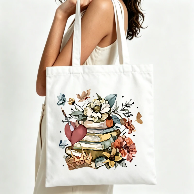 Women's floral book stack canvas tote bag with heart and butterfly, vintage style for daily shopping and casual outings