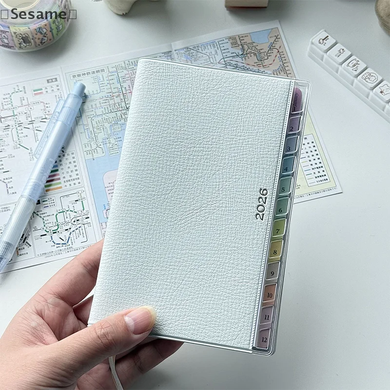 [السم] دفتر التقويم مذكرات 2026 مخطط مع كتيب جدول قشرية قوس قزح عالي القيمة ملاحظة عمل الخطة الأسبوعية الشهرية