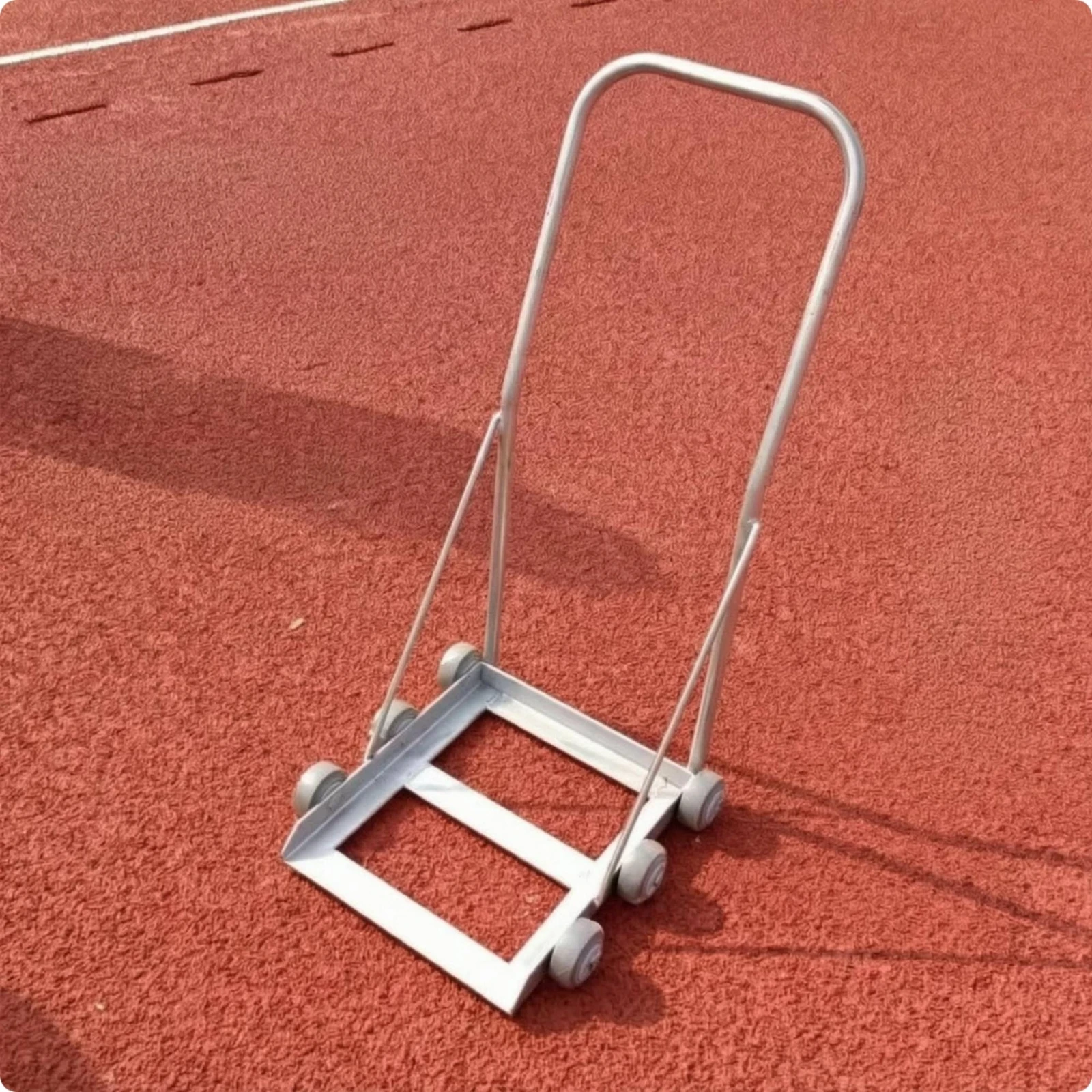 carrello-a-spinta-manuale-con-telaio-ribassato-e-maniglia-cilindrica-in-metallo-piattaforma-di-carico-non-ostruita