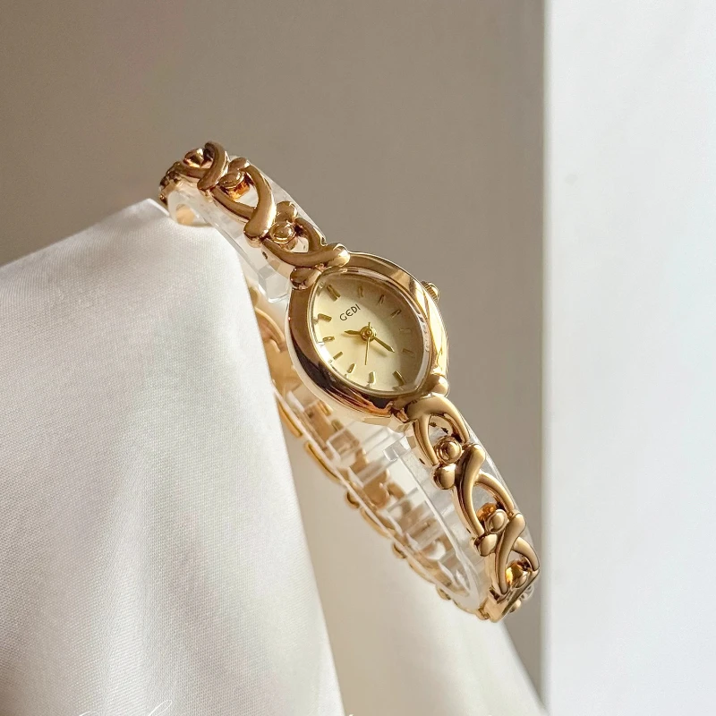 2025 Exquisite Gold Bracelet Women's Quartz Watch Creative Clock Waterproof Steel Belt Fashion Women's Watch Luxury