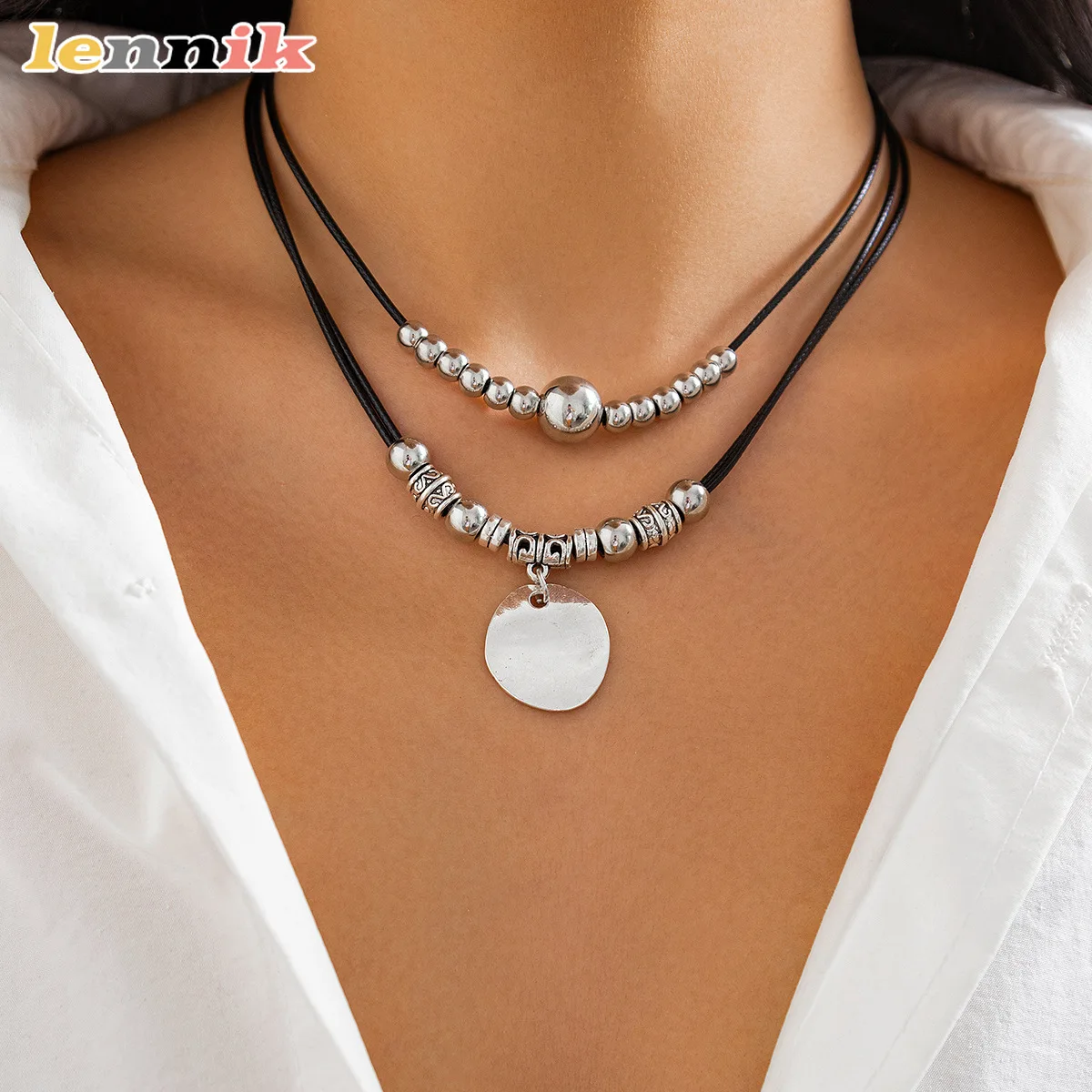 LENNIK Conjunto de pulsera y collar de cuero tejido negro, elegante y sencillo para mujer, colgante cilíndrico de bambú plateado, cadena de cuerda de cera