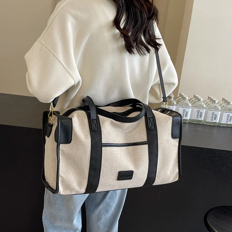 Bolso de viaje de gran capacidad para mujer, bolsa de tela Oxford de alta calidad con bloqueo de Color, multifuncional y a la moda, novedad de 2024