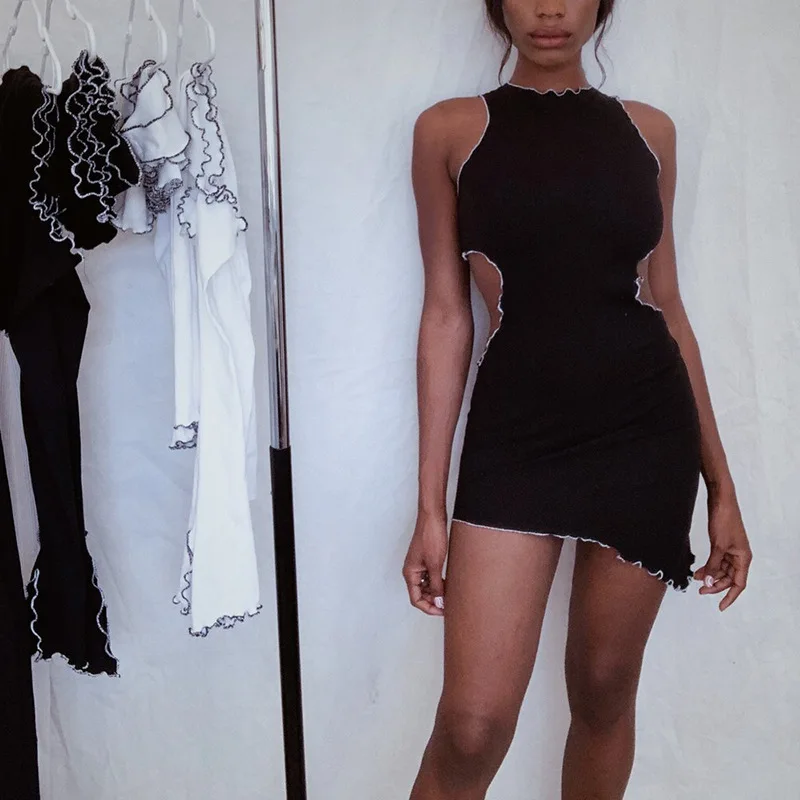 

European and American spring and summer new sleeveless vest waist hollow sexy dress solid color irregular women's dress