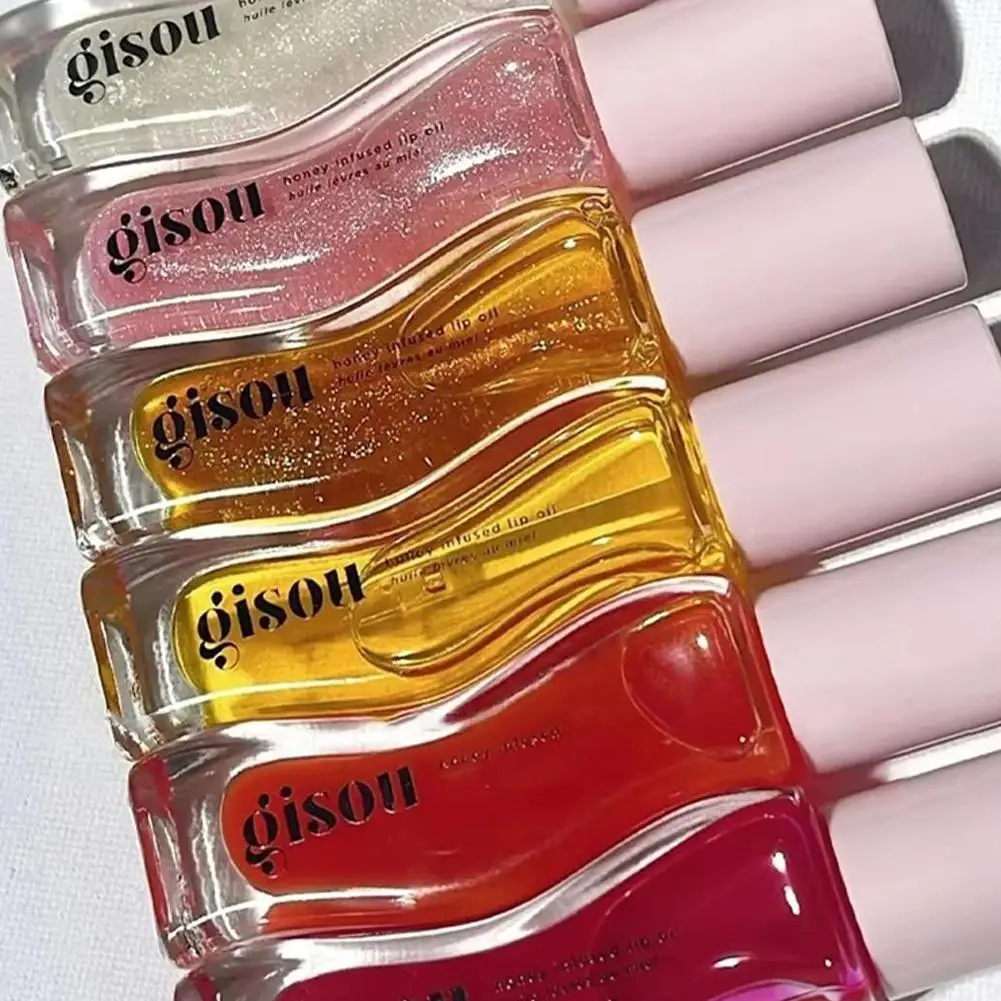 الفاكهة العسل جوهر زيت الشفاه مثير طبطب الشفاه هلام الفراولة ملون الشفاه السائل مقاوم للماء ترطيب النفط ملمع الشفاه ماكياج ماكياج ﻿