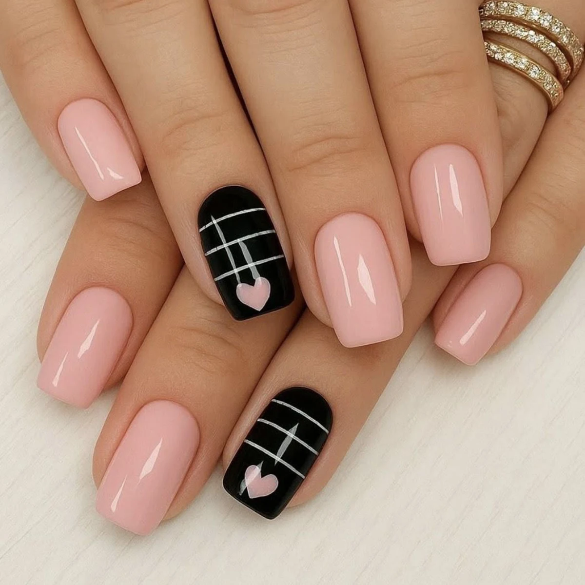 Full set of 4 packs/96 short square false nails, featuring classic black and white style with bows and heart prints, perfect for