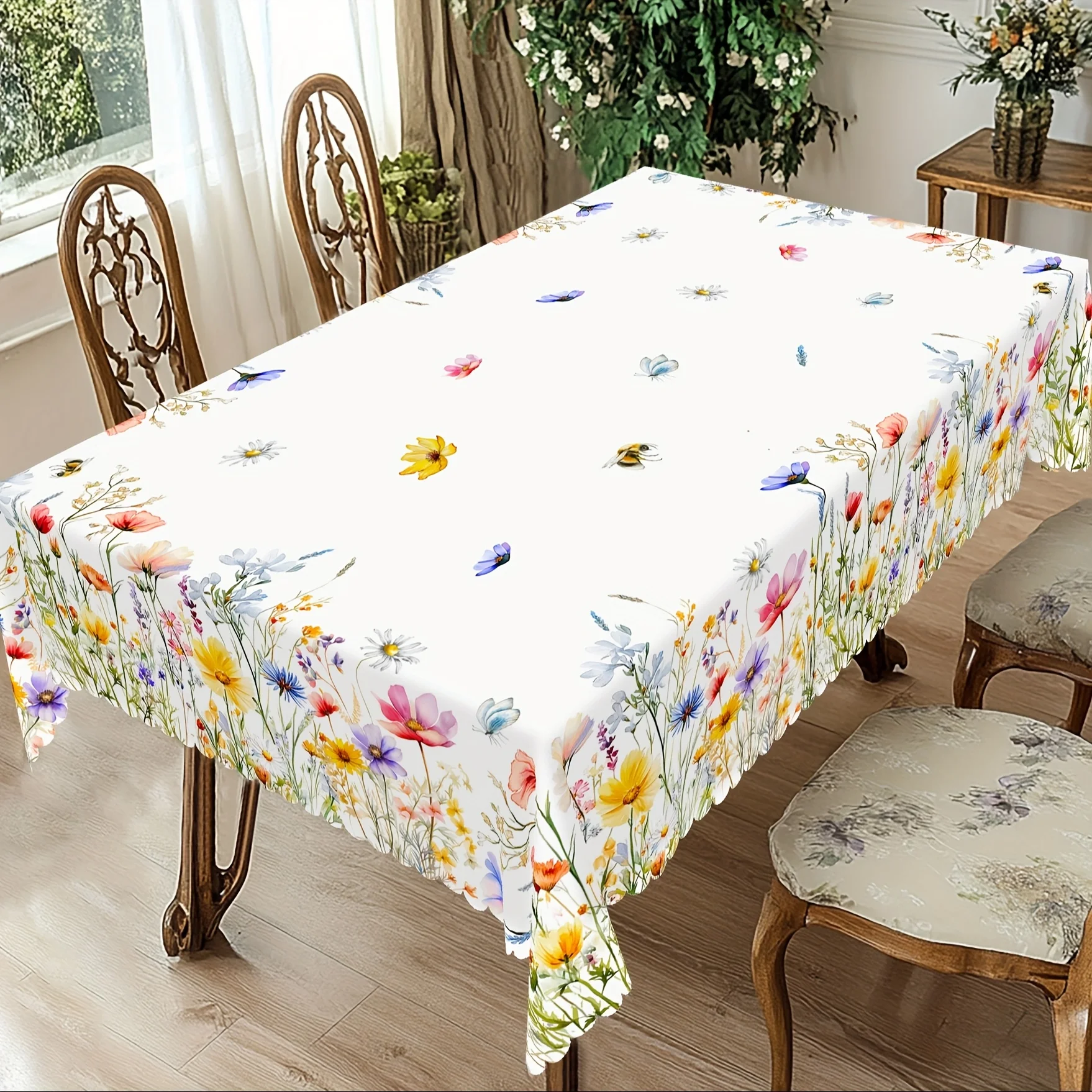 A Spring Floral Tablecloth Available in  It Features Colorful Flowers, Butterflies, And Bees in Its Design