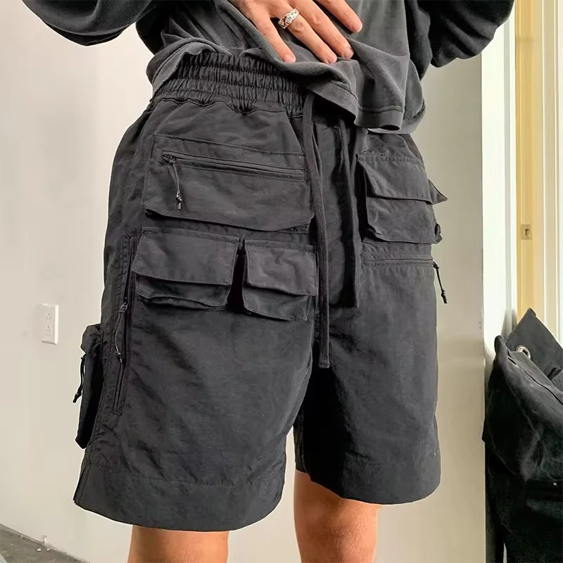 

Summer 2025 New Fashion Men's Solid Color Casual Trendy Loose Straight Wide Leg Multi Pocket Knee Length Shorts Male Clothes