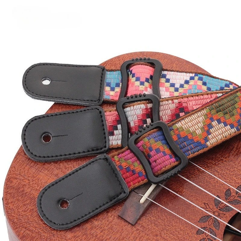 

Bohemian style ukulele leather head strap ethnic style tail nail shoulder strap