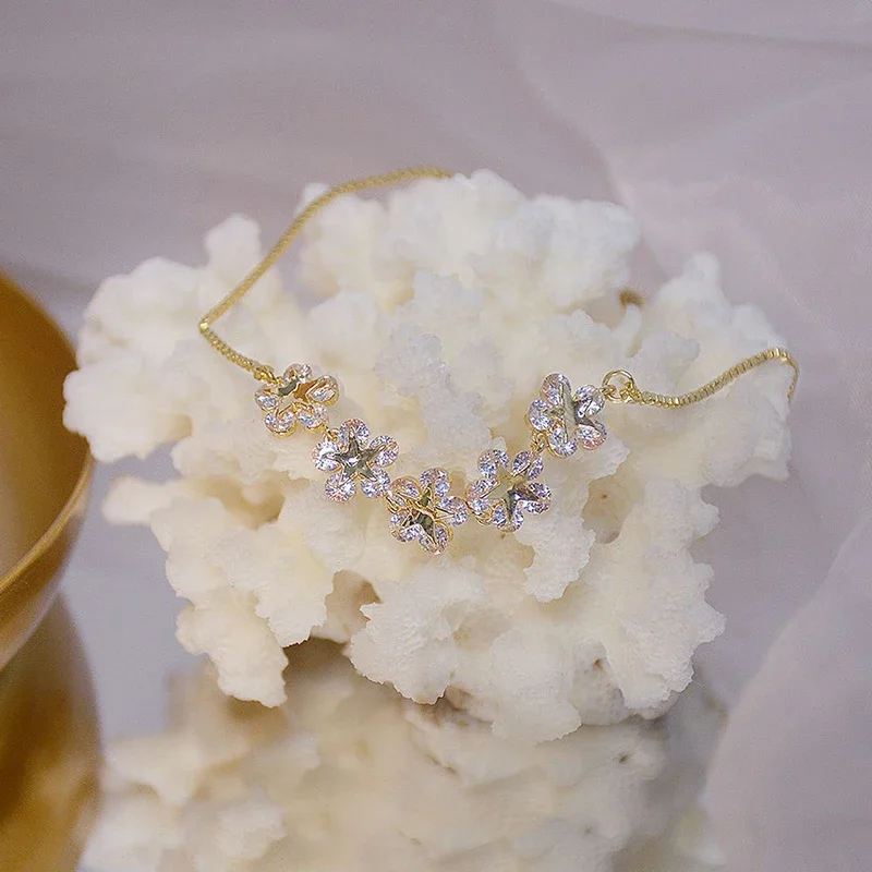 เกาหลีแฟชั่นเครื่องประดับ14KชุบทองแดงฝังAAA Zirconสร้อยข้อมือดอกไม้ยืดปรับสร้อยข้อมือผู้หญิง