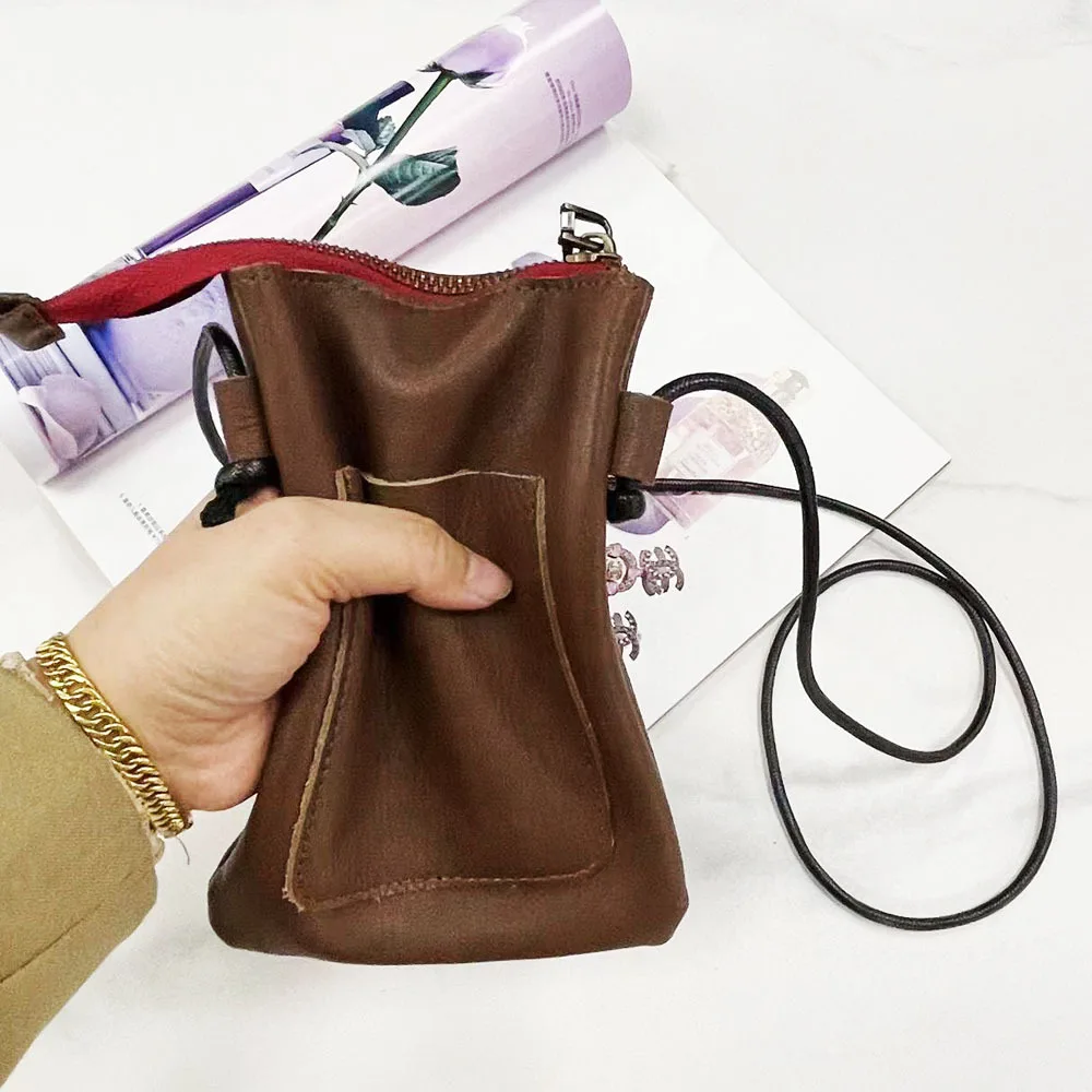 2024 Head Cowhide Casual Crossbody Bag Męska i damska smycz Torba na telefon komórkowy Zmień torebki i torebki Crossbody