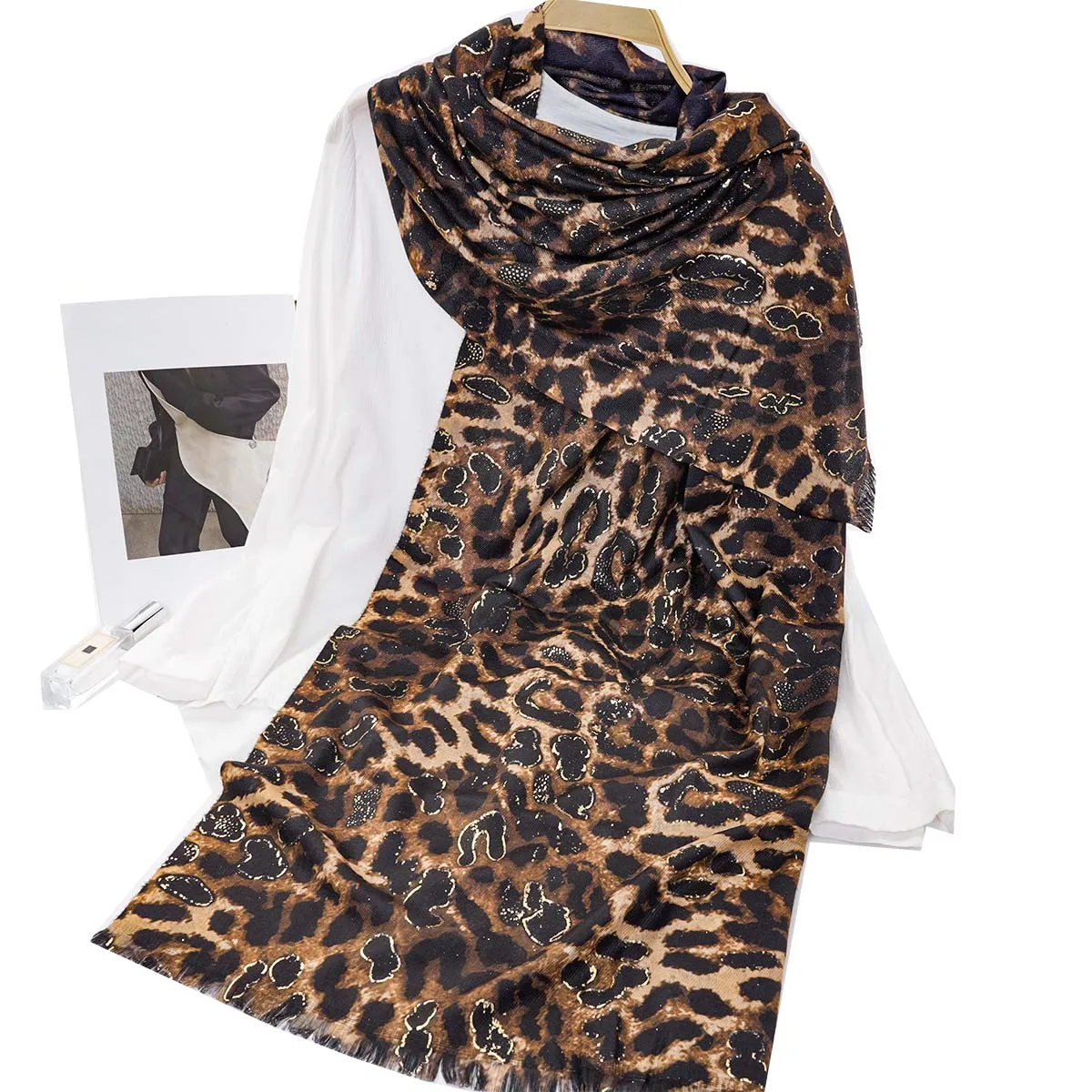 A women\'s leopard print hot stamping warm neck scarf and shawl that can be used as a daily gift