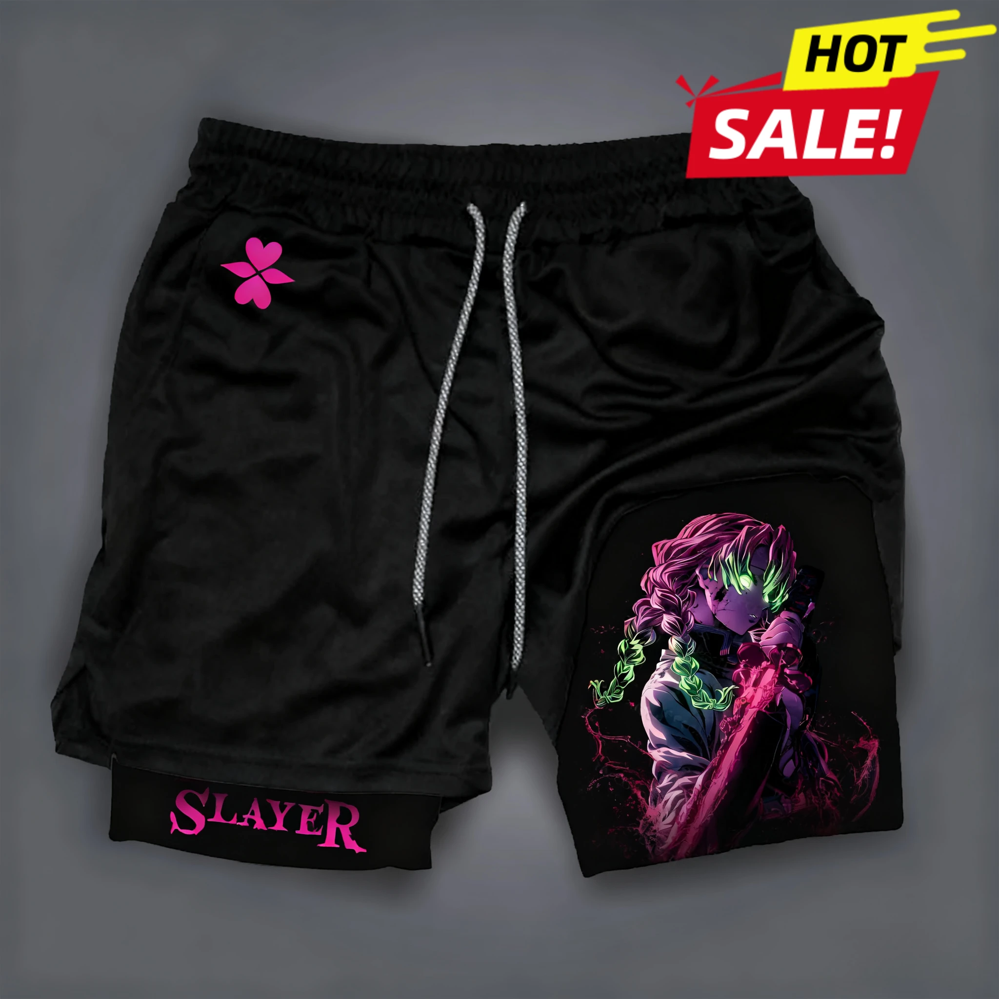 鬼滅の刃の人気キャラクタープリントの二重層Y2Kスタイルのメンズビーチパンツは非常に目を引く