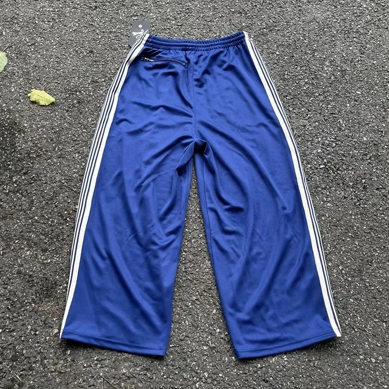 25ss bordado de mariposa AWGE pantalones de pierna ancha azules hombres mujeres 1:1 pantalones casuales a rayas Jogger pantalones con cordón para hombre