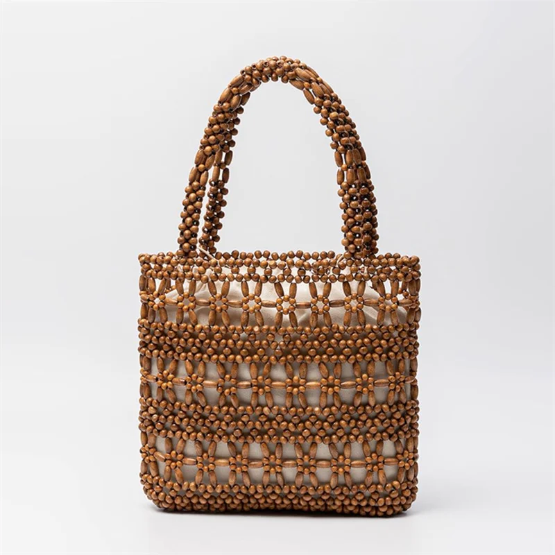 

Fashion Women's Beach Vacation Tote Bags Seaside Travel Wooden Bead Woven Handbag Solid Color Leisure Hollow Out Bag Bolso Mujer