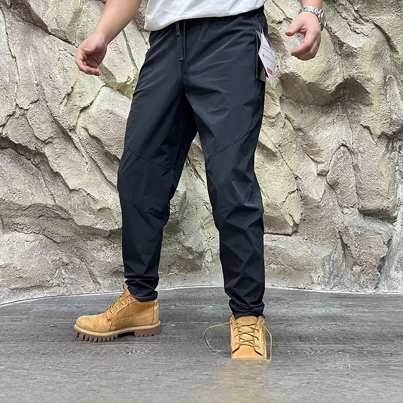 

New 2025 Spring Men's Outdoor Casual Pants Elastic Training Trousers Qui Dry Tailored Fit Straight Leg Breathable Faionable