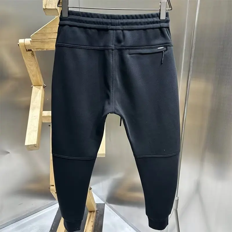 Pantaloni da jogging casual ispessiti in peluche per uomo in autunno e inverno Nuovo abbigliamento sportivo da esterno resistente al freddo e caldo