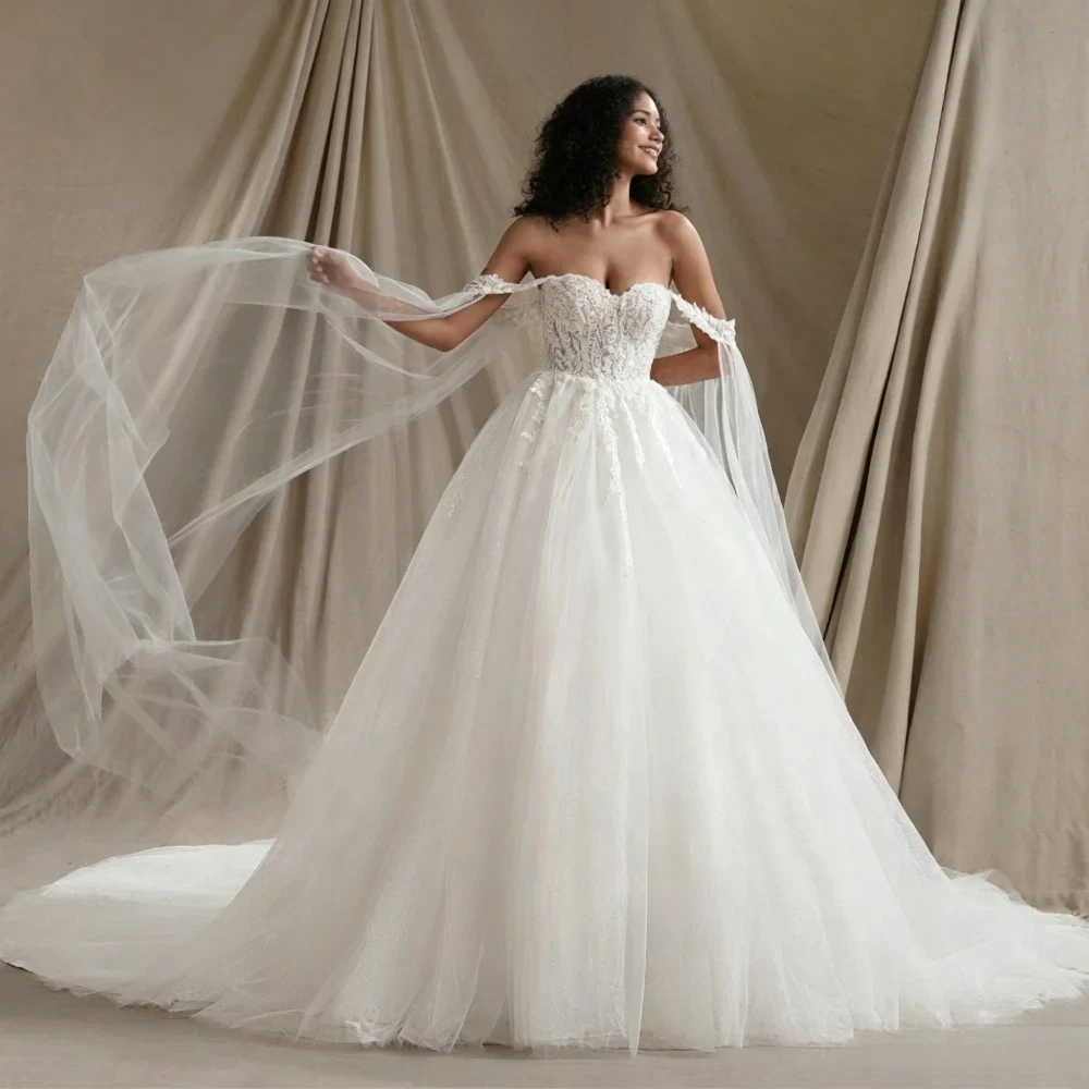 Customized Gorgeous Princess Round Neck Wedding Dresses 2026 Ivory Modern Decal Bridal Gown Decoration Pearl Embroidery Behind