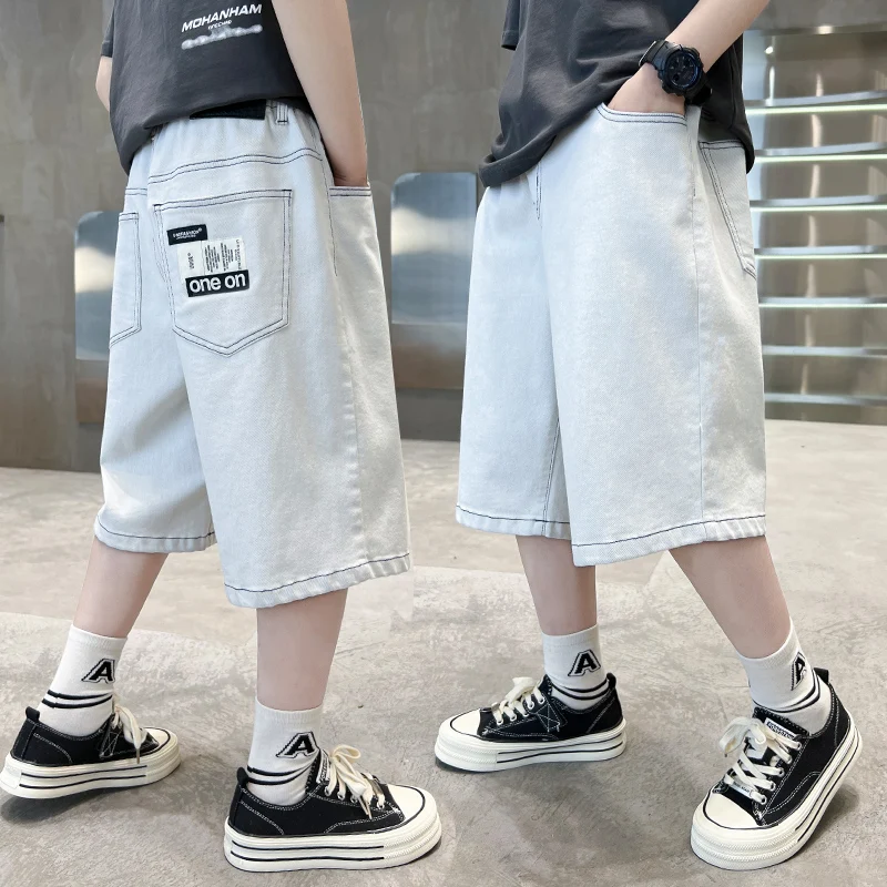 

2025 New Summer Children Brief Style White Shorts for Tweens Boy Casual Street Bottoms Kids Fashion Loose Straight Jeans Capris