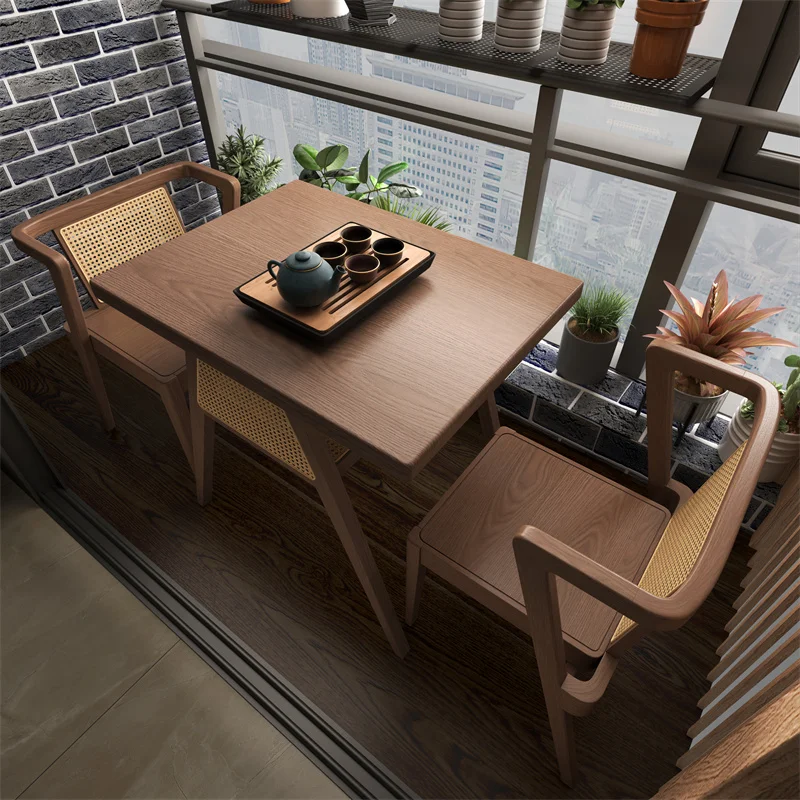 Small apartment leisure area layout, family tea, reading, rattan weaving, one table, two chairs, three piece balcony tea table