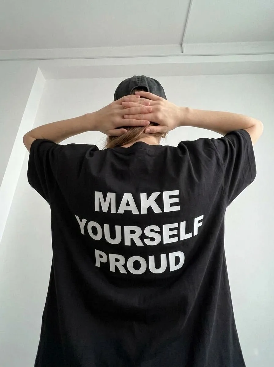 ゆったりとしたハイストリートスタイルの半袖tシャツ、韓国風モチベーションアップカジュアルウェア、2026年春の着痩せ効果あり