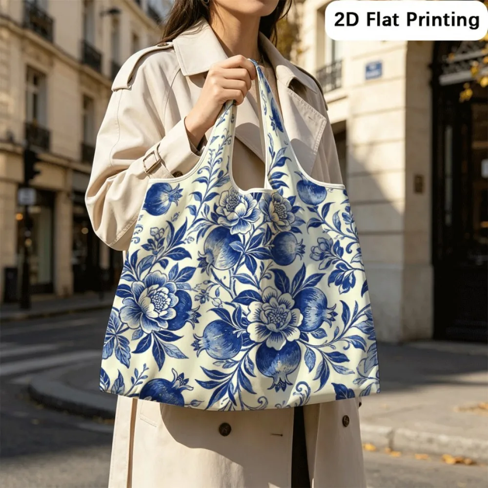 Blue Pomegranate Blossom Space‑saving foldable shoulder tote, must‑have for student trips.