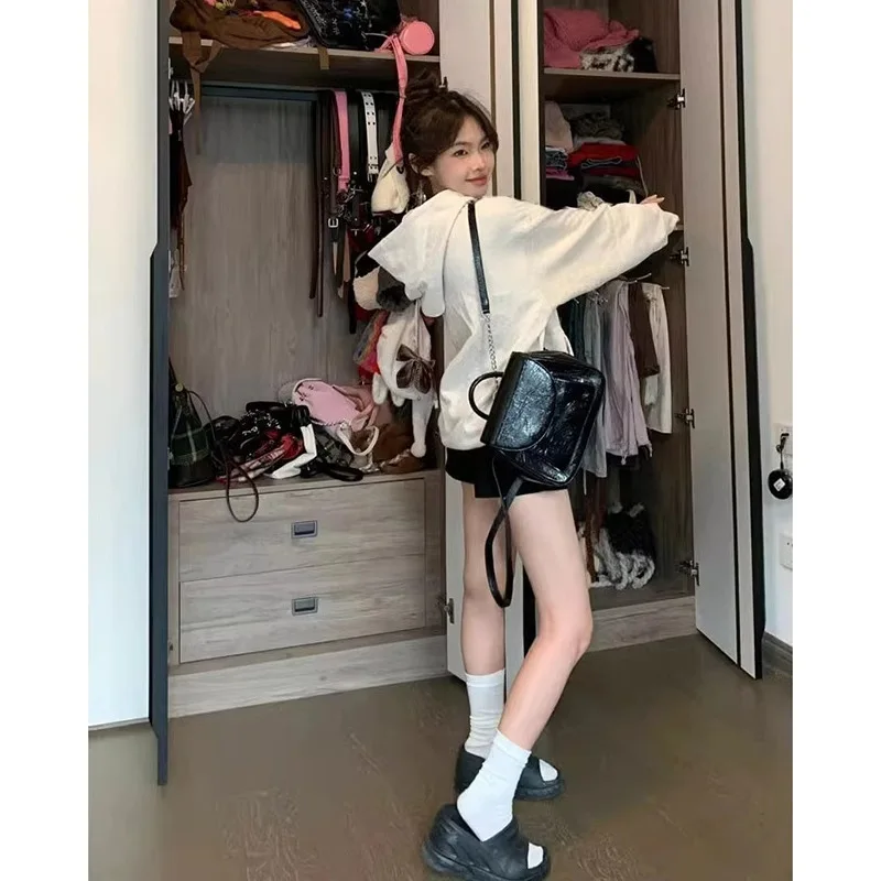 Suéter de lana para mujer, abrigo Retro americano con capucha, pequeño, holgado, coreano, viento perezoso, novedad de Otoño de 2025