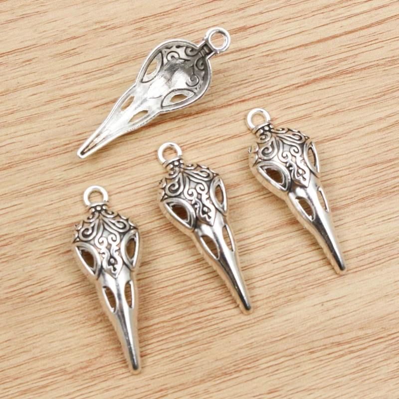 15pcs 35x13mm Antique Argent Plaqué Oiseau Crâne Squelette Chrams Alliage Métallique Pendentif BRICOLAGE Charmes DIY Bijoux faisant des Résultats