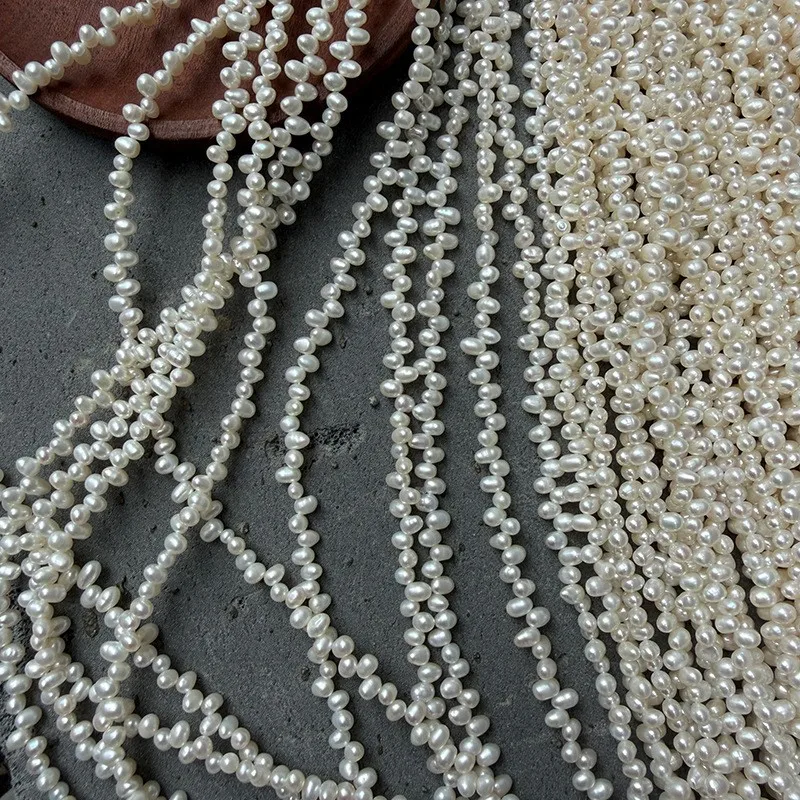 3-3.5mm Sanqi-hole rice beads, offset and irregular, freshwater, nucleus-free, natural, smooth, DIY, extended length 39cm.