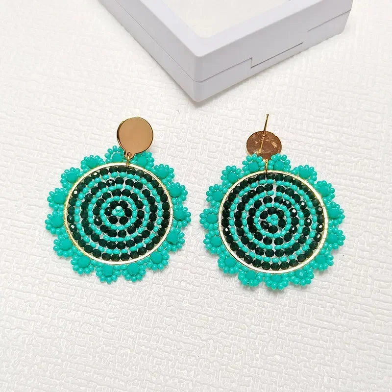 Rice bead earrings Crystal Green Sun Originality Hollow out Hand knitting Bohemia Alloy Fashion Simple Roundness Beaded earrings image 3