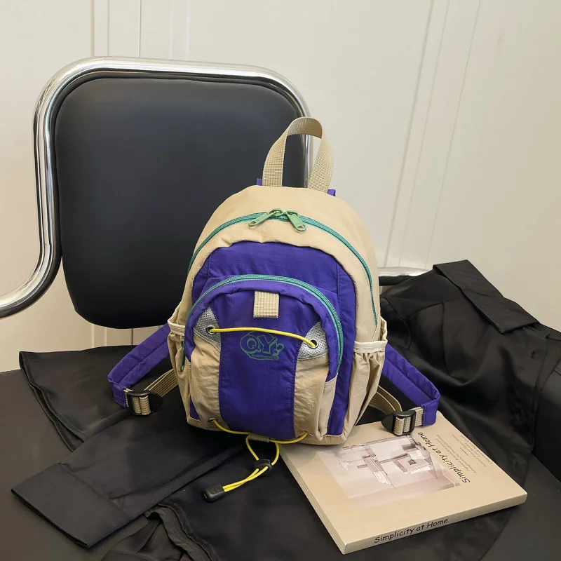 Women's dopamine color-blocking high-appearance small backpack, student schoolbag, lightweight and burden-reducing outdoor leisu