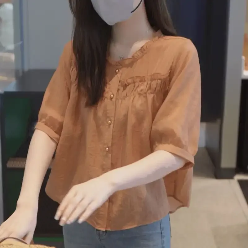 

Women's Sweet Round Neck Patchwork Button Ruffle Blouse 2026 Summer New Loose Versatile Korean Top Trendy