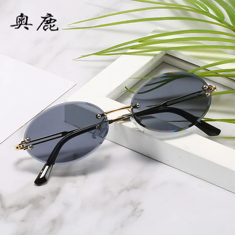 

Frameless diamond-trimmed Women Sunglasses Gradient Oval Sun Glasses Travel Outdoor Men Driving Fish Fashion