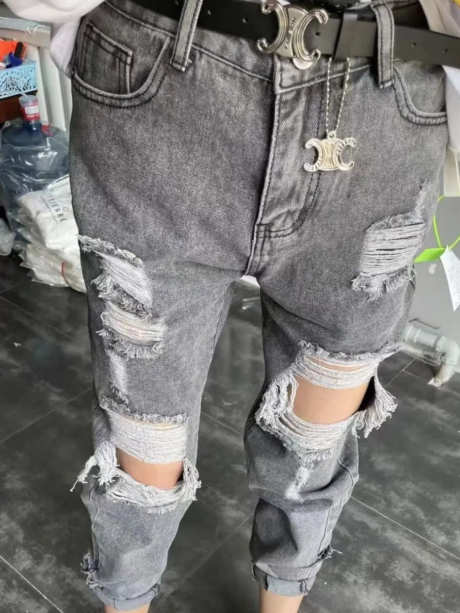 

Модные женские джинсы-харлан с высокой талией, рваные, осенне-зимние, новые, стильные, облегающие, укороченные, повседневные, хлопковые...