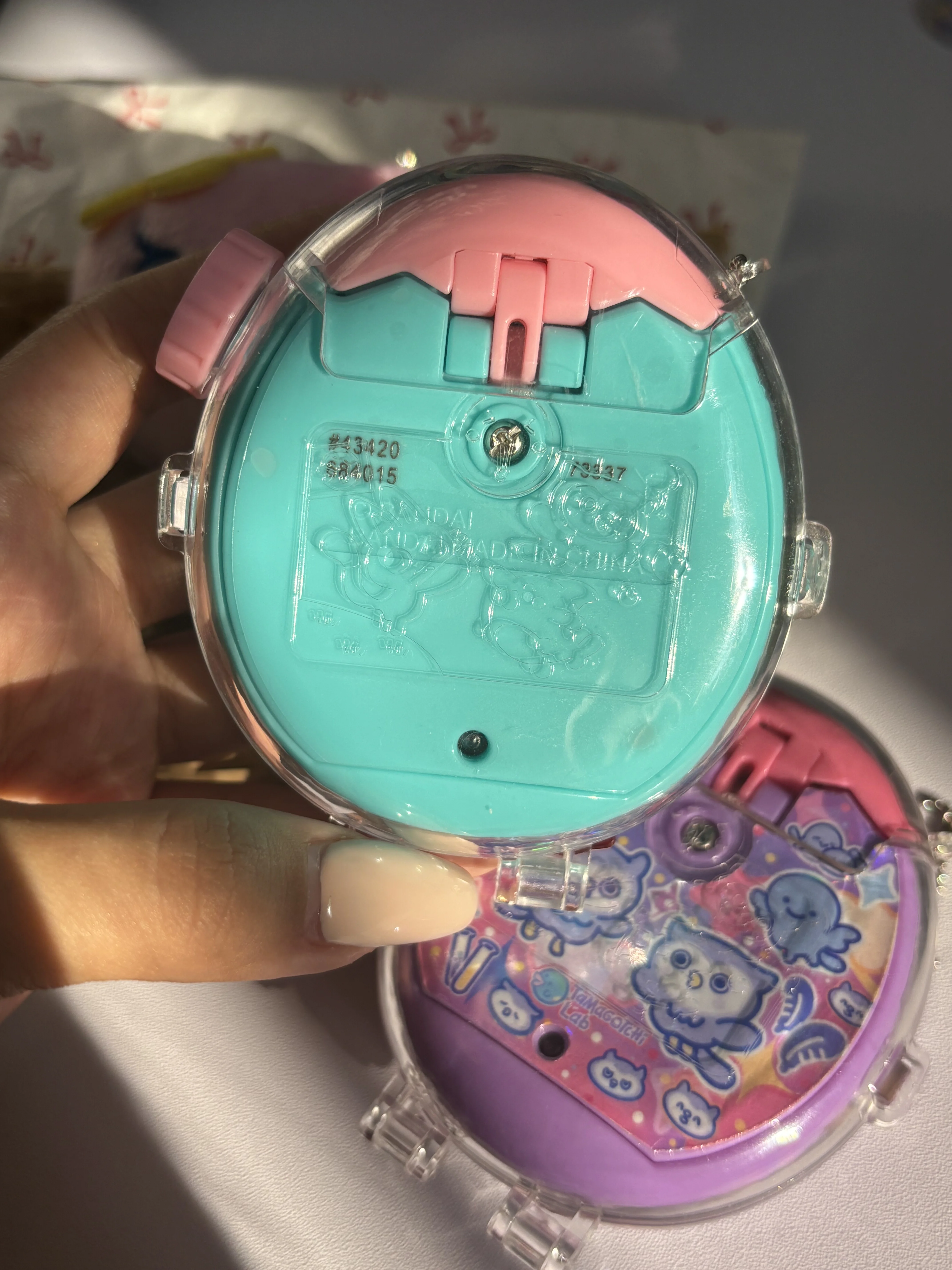 Étui de protection rigide transparent Tamagotchi Paradise au design original