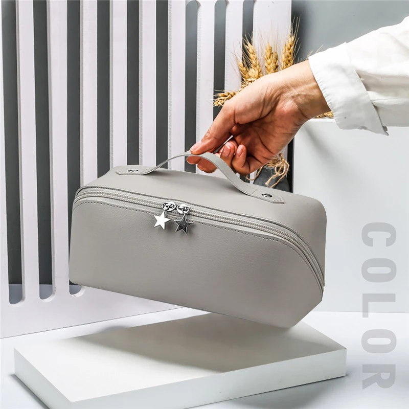 Bolsa de maquillaje de tendencia, Kit de almacenamiento de cosméticos de gran capacidad, bolsa de aseo de viaje, bolsa de maquillaje Ins Advanced Sense, bolsa de almacenamiento portátil