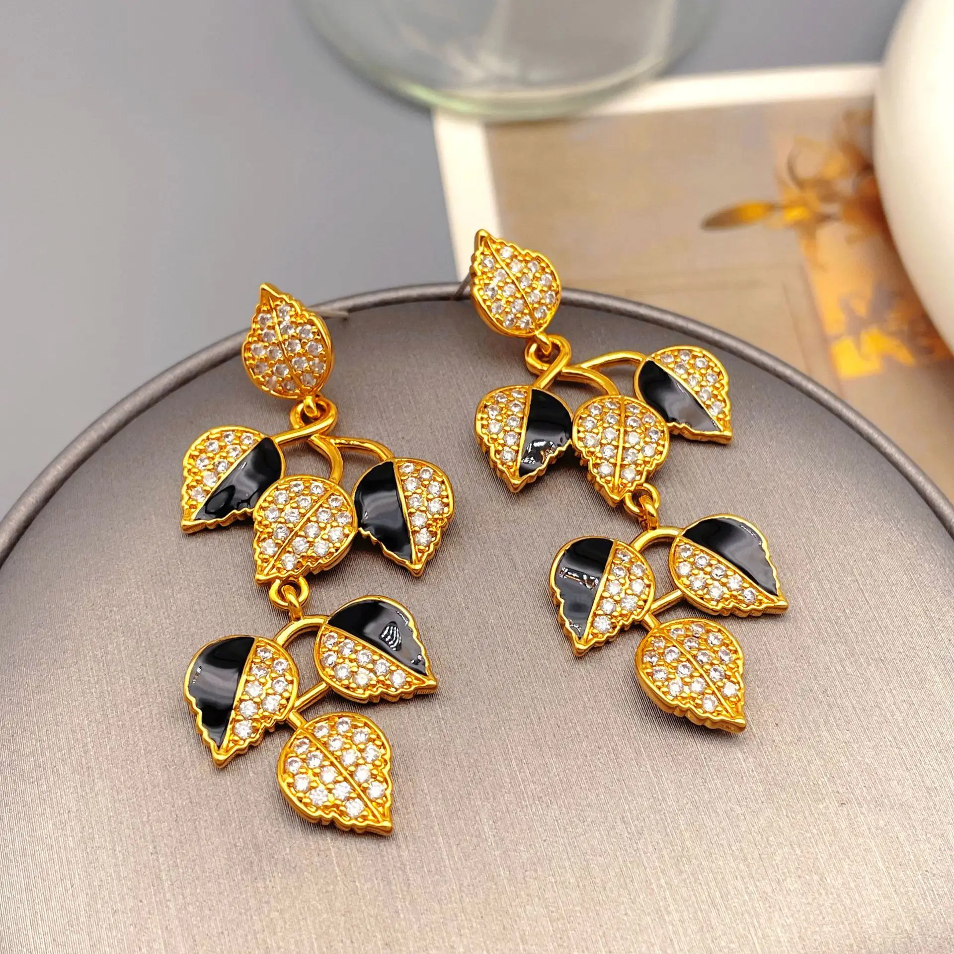 

European and American retro full of zircon fringed leaves enamel glazed ancient earrings