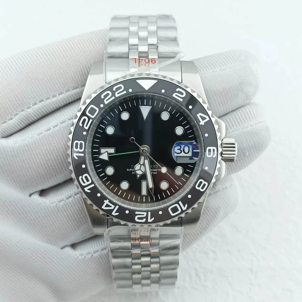 S-Logo GMT NH34 Edelstahl Leuchtzifferblatt Mechanisch Wasserdicht 40 mm Herrenarmbanduhr Installieren Sie das NH34-Uhrwerk