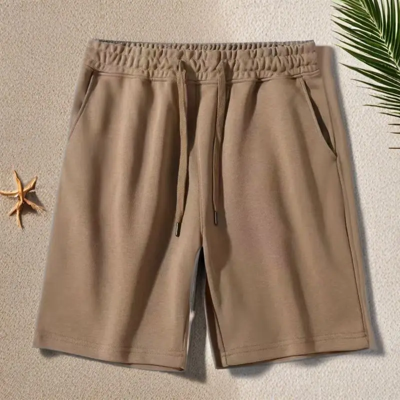 

Модные однотонные повседневные шорты со сращенными карманами, мужская одежда, новинка лета 2025 года, свободные универсальные эластичные шорты до колена с высокой талией