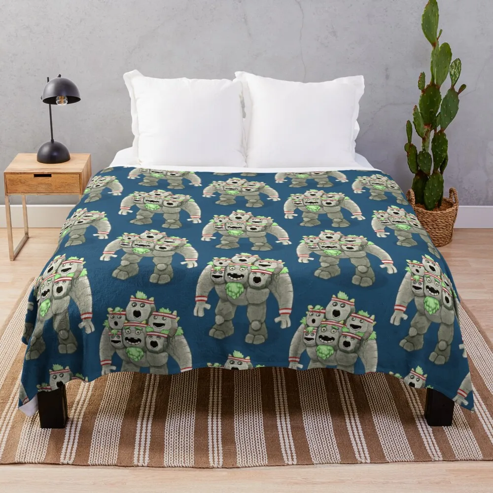 

My Singing Monsters character Quarrister Throw Blanket