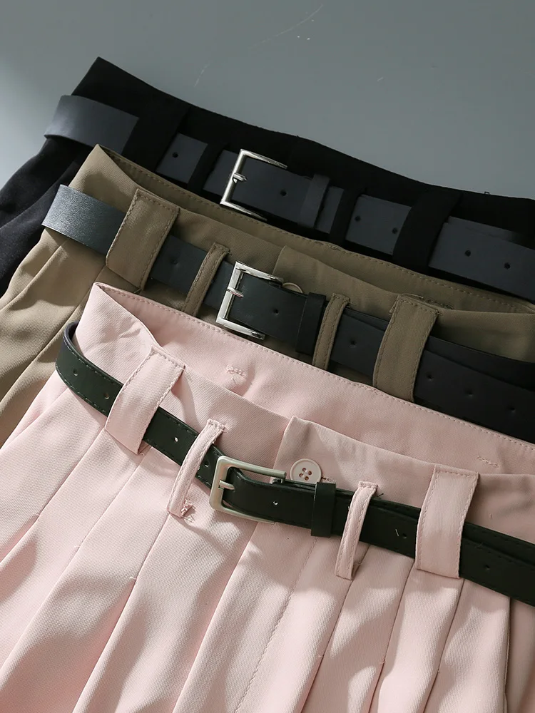 بنطلون نسائي واسع الساق بخصر مرتفع باللون الوردي، سروال فضفاض طويل يصل للأرض يخفي الوركين ويمنح مظهراً نحيفاً