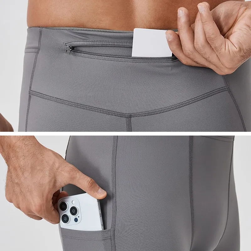 春秋男性ランニングタイツジムパンツ男性バスケットボールサッカーサッカーフィットネスパンツ運動スポーツポケットロングレギンス A55