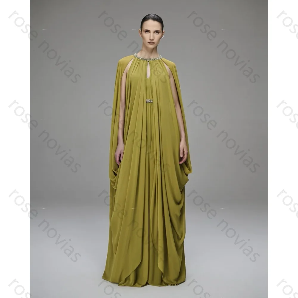 

Customized Green Formal Evening Gown with Cape Sleeves Crystal-Embellished Neckline and Keyhole Detail for Gala