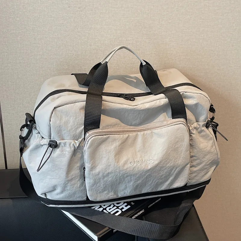 foldable-short-trip-large-capacity-women's-travel-bag-separate-wet-and-dry-fitness-sports-bag-handheld-luggage-for-business-t