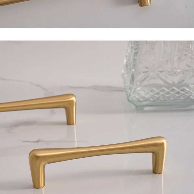 Brushed brass cupboard pull and teardrop knob shown in the supplier product illustration 20