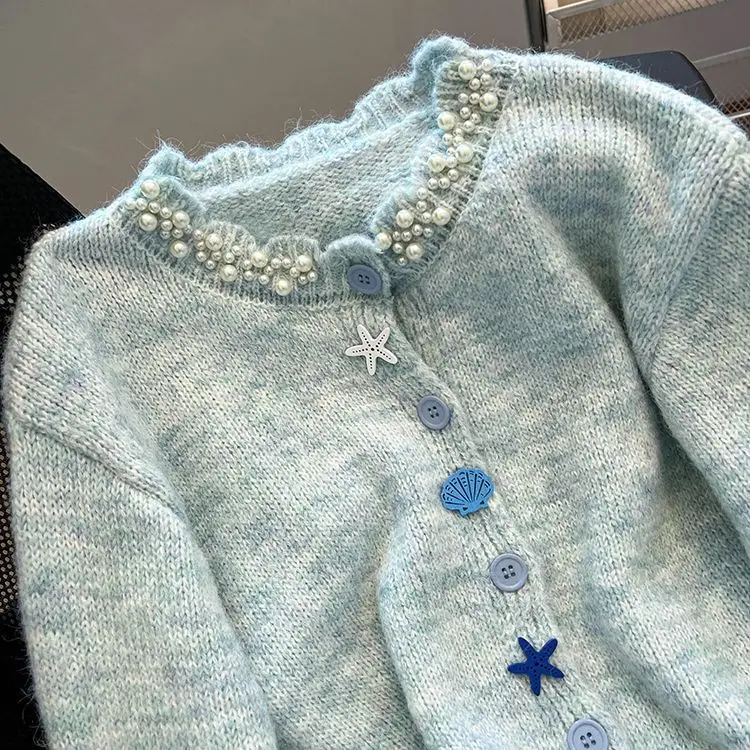 เสื้อโค้ทแฟชั่นเกาหลีสำหรับผู้หญิง ฤดูใบไม้ร่วง ฤดูหนาว น่ารัก สไตล์หวานๆ ยุค 2000 เสื้อสเวตเตอร์หรูหรา ทรงโอเวอร์ไซส์ เสื้อถักสไตล์สวยงาม ดีไซน์กระดุมเก๋ไก๋ รุ่นใหม่